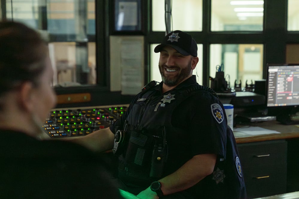 corrections officer smiling