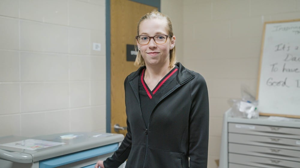 corrections nurse smiling