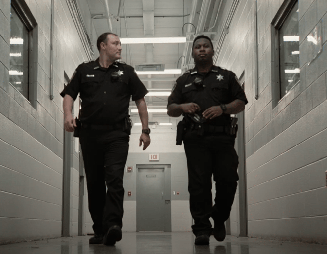 Correctional officers conducting inmate headcount