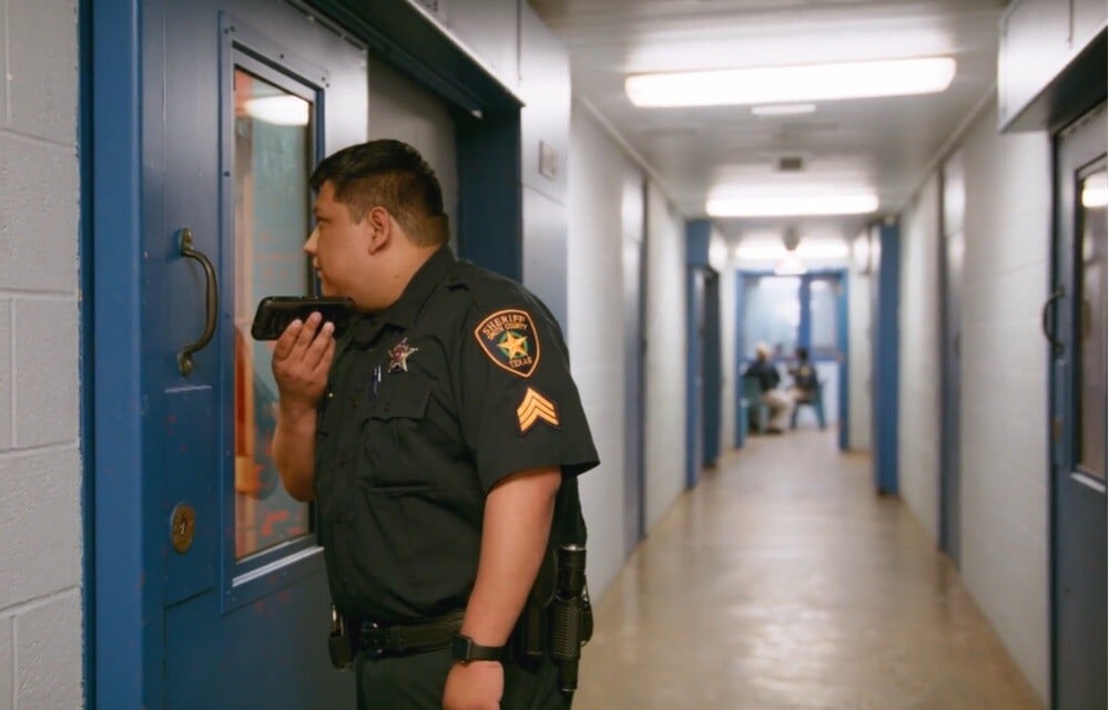 Correctional officer conducting rounds