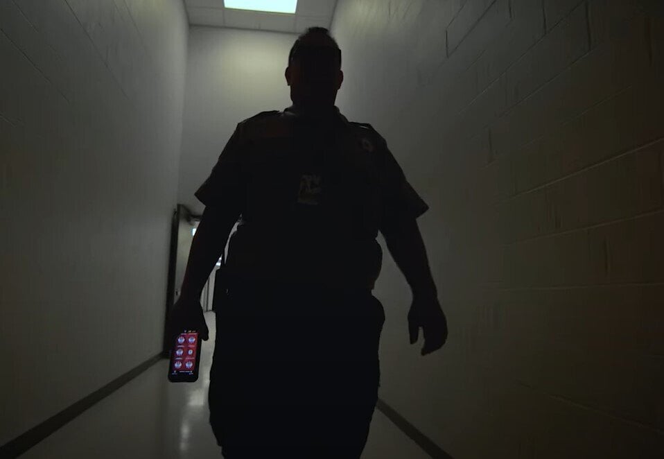 corrections officer walking with SPARTAN